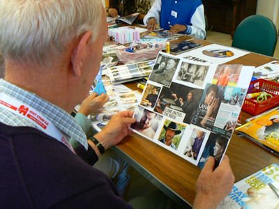 Client living with dementia viewing their collage