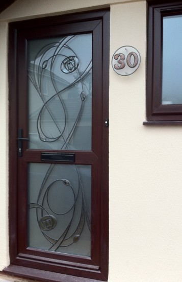 Bevelled door & house number.